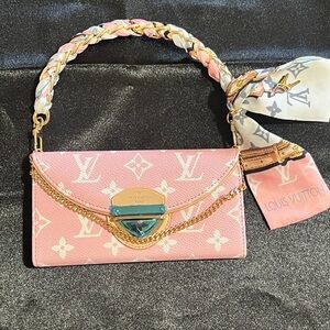 Louis Vuitton Pink iPhone 16 Pro Clutch with Gold Accents
